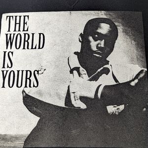 Nas The World is Yours Black Sweatshirt - Bold Graphic of Artist on Fron…